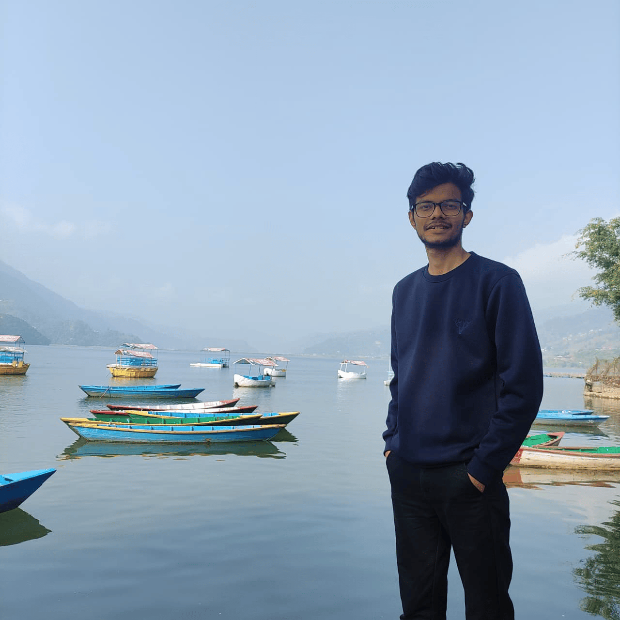 Vishal Pokharel beside a lake in Nepal